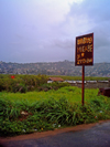 Lumley Beach, Freetown Peninsula, Sierra Leone: 'Bravo Mugabe of Zimbabwe' road side signpost - photo by T.Trenchard