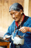 Sikkim - Rumtek: Enchey monastery - preparing butter candles - photo by G.Frysinger