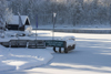 Slovenia - Bohinj Lake starting to freeze over - tourist boat pier - photo by I.Middleton