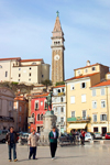 Slovenia - Piran: people on Tartinijev Trg - photo by I.Middleton