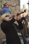 Slovenia - Ljubliana: Pust celebrations - musian at the Preseren monument - photo by I.Middleton