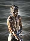 near Yalla National Park, Sri Lanka: near Yala National Park / Ruhuna: soap covered river bather - photo by B.Cain