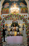 Maaloula - Rif Dimashq governorate, Syria: St Takla monastery - church - altar and floral arch - Constantin - photo by M.Torres / Travel-Images.com