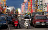 Taiwan - Taipei city - waiting at a traffic light - photo by Bob Henry