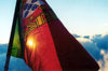 East Timor - Timor Leste: dusk of the Portuguese empire - flag - bandeira Portuguesa (photo by Mrio Tom)