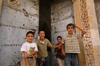 Mardin - Southeastern Anatolia, Turkey: children and large gate - photo by J.Wreford