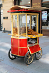 Istanbul, Turkey: simit bread troley on Istiklal caddesi in front of Denizler Kitabeyi, a bookshop - Beyoglu - photo by M.Torres