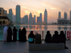 Dubai, UAE: Skyscrapers skyline - people watching - photo by J.Kaman