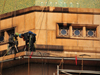 Kampala, Uganda: Baha'i Temple on Kikaaya Hill - workers cleaning the facade with high pressure water - photo by M.Torres