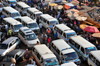 Kampala, Uganda: African city traffic - Burton street fraffic from above - share taxis and sellers - Old Taxi Park - chaotic aglomeration of matatu share taxis - photo by M.Torres