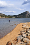 Estes Park, Larimer County, Colorado, USA: beach on Lake Estes - angler and mountain - photo by M.Torres