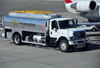 Boise, Idaho, USA: Western Aircraft Jet A fuel truck (International ) and SkyWest CRJ200ER - Boise Airport - Gowen Field - BOI - photo by M.Torres