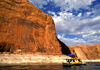 Lake Powell, Utah, USA: a house boat enters Reflection Canyon - photo by C.Lovell