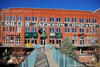 Oklahoma City, OK, USA: Bricktown - Miller Jackson Company building and pedestrian bridge over the Bricktown Canal - photo by M.Torres