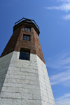 Point Judith, Narragansett, Rhode Island: Point Judith Lighthouse - entrance to Narragansett Bay, near Block Island Sound - white and brown granite tower - famous for the tragic loss of the German Kriegsmarine's U-853 with all its crew - photo by M.Torres