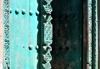 Stone Town, Zanzibar, Tanzania: ornately carved rustic wooden door - Malindi area - photo by M.Torres